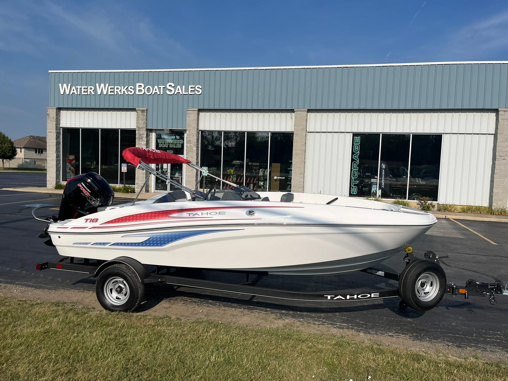 Tahoe T18 2024 Tahoe T18 boat on trailer outside Water Werks Boat Sales.