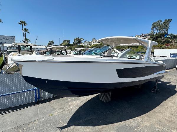 Aviara AV36 2024 Aviara AV36 boat displayed on a stand in a marina.