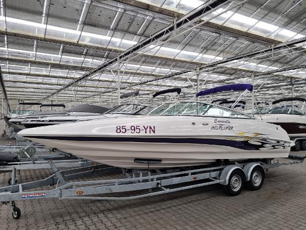 Caravelle 232 Interceptor 2006 Caravelle 232 Interceptor boat on trailer in indoor storage facility.