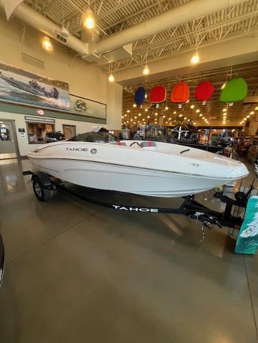 Tahoe T16 2025 Tahoe T16 boat displayed indoors with colorful ceiling lights.