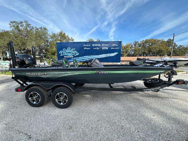 Ranger RT198P 2024 Ranger RT198P boat on trailer, parked outdoors under a clear sky.