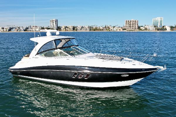 Cruisers Yachts 35 Express 2012 Cruisers Yachts 35 Express on calm water with city skyline background.