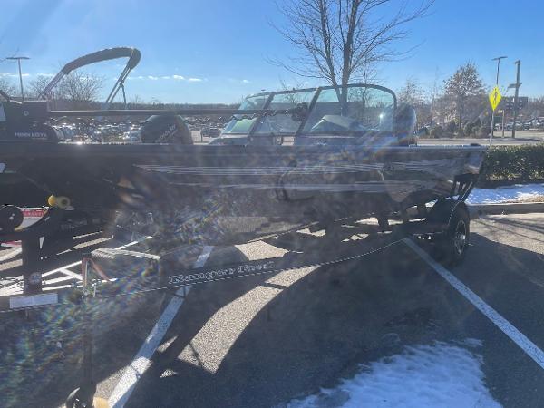 Ranger VS1782SC Angler 2024 Ranger VS1782SC Angler boat on trailer in parking lot, sunny day.