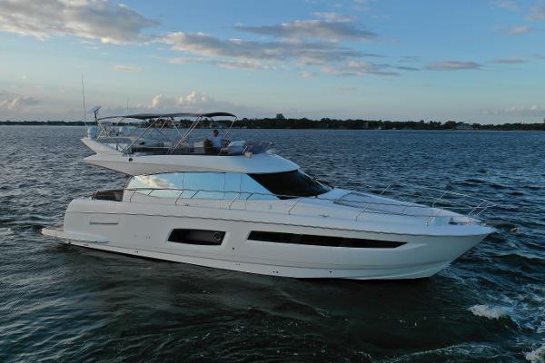 Prestige 550 Fly Bridge 2015 Prestige 550 Fly Bridge yacht cruising on open water.