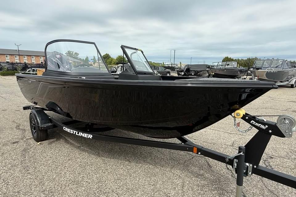 Crestliner 1750 HAWK WT 2026 Crestliner 1750 HAWK WT boat on trailer, parked outdoors.