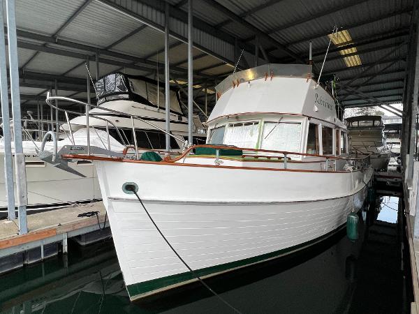 Grand Banks 42 Classic 1972 Grand Banks 42 Classic yacht docked in a covered marina.