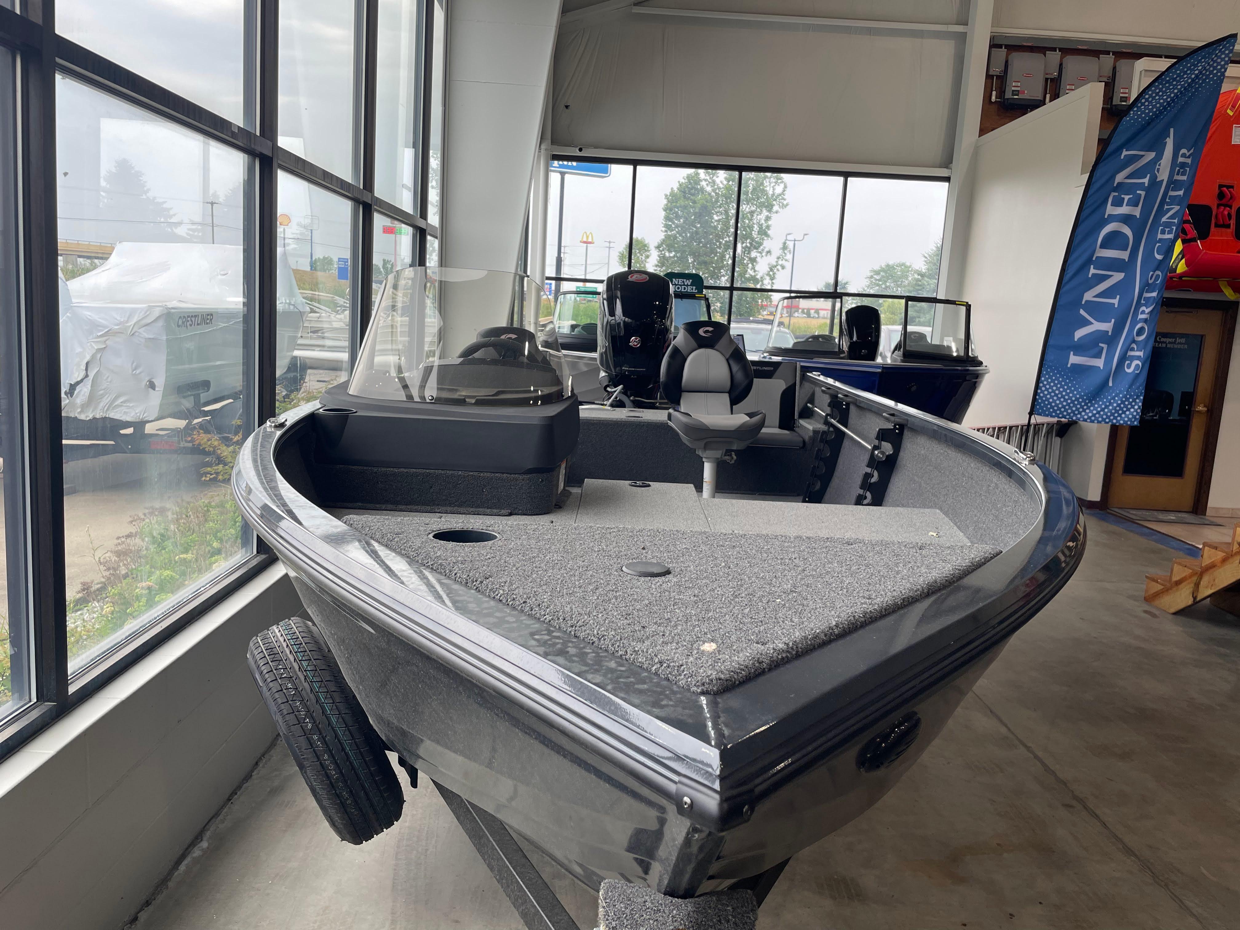 Crestliner 1750 Hawk SC 2025 Crestliner 1750 Hawk SC boat displayed indoors at a dealership.