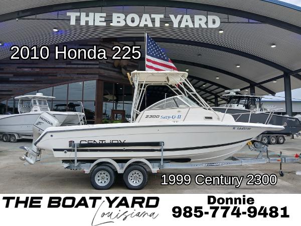 Century 2300 1999 Century 2300 boat with 2010 Honda 225 engine at The Boat Yard, Louisiana.
