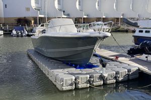 White Shark 246 2017 White Shark 246 boat docked on floating platform in marina.