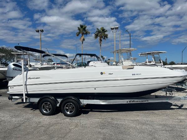 Hurricane Center Console SS 231 OB 2022 Hurricane Center Console SS 231 OB boat on trailer, parked outdoors under a blue sky.