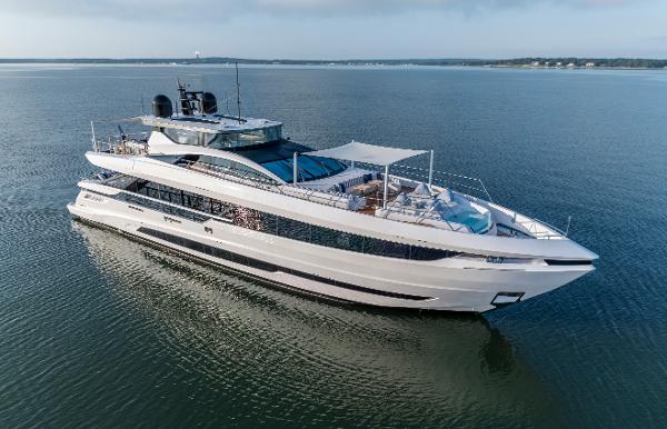 Mangusta Gransport Luxurious 2023 Mangusta Gransport yacht cruising on calm waters.