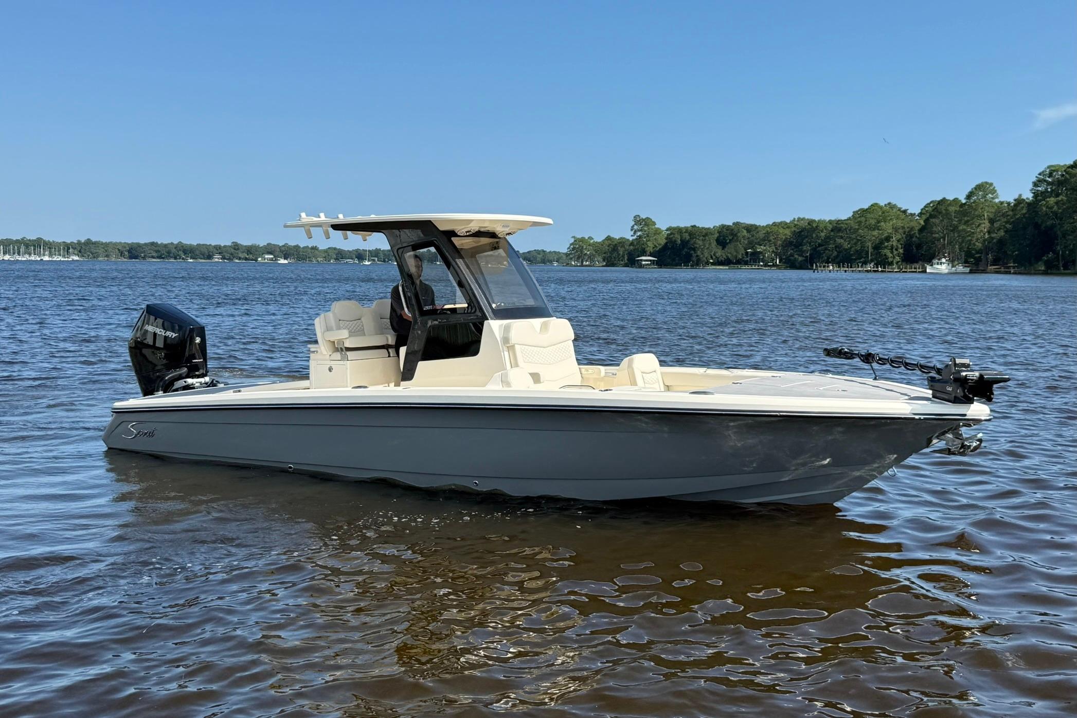 Scout 281 XSS 2026 Scout 281 XSS boat on calm water, featuring sleek design and modern amenities.