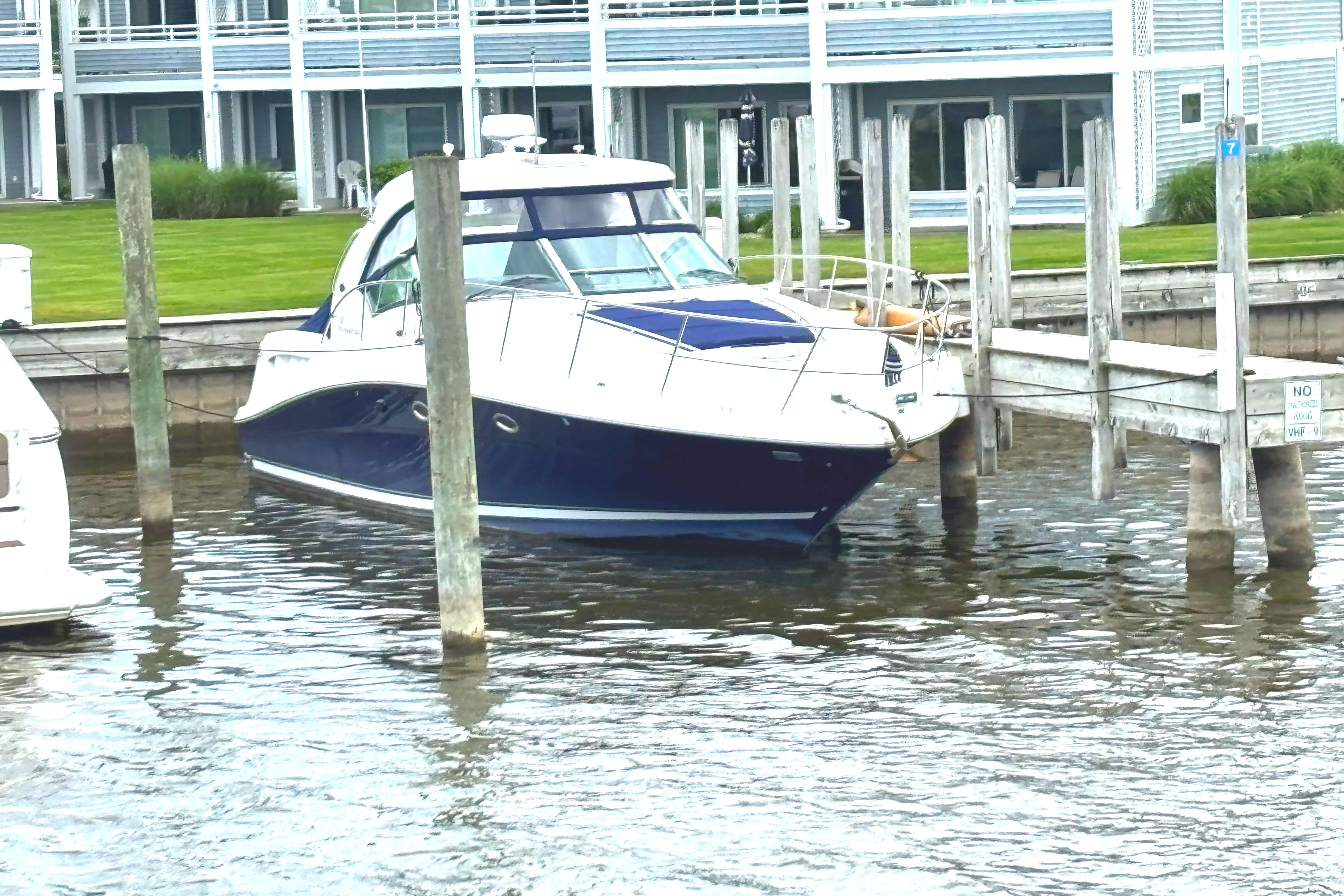 Sea Ray 390 Sundancer 2005 Sea Ray 390 Sundancer yacht docked at marina with waterfront view.