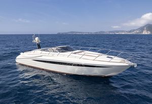 Riva Rivale 52 2016 Riva Rivale 52 yacht cruising on open sea with scenic coastal backdrop.