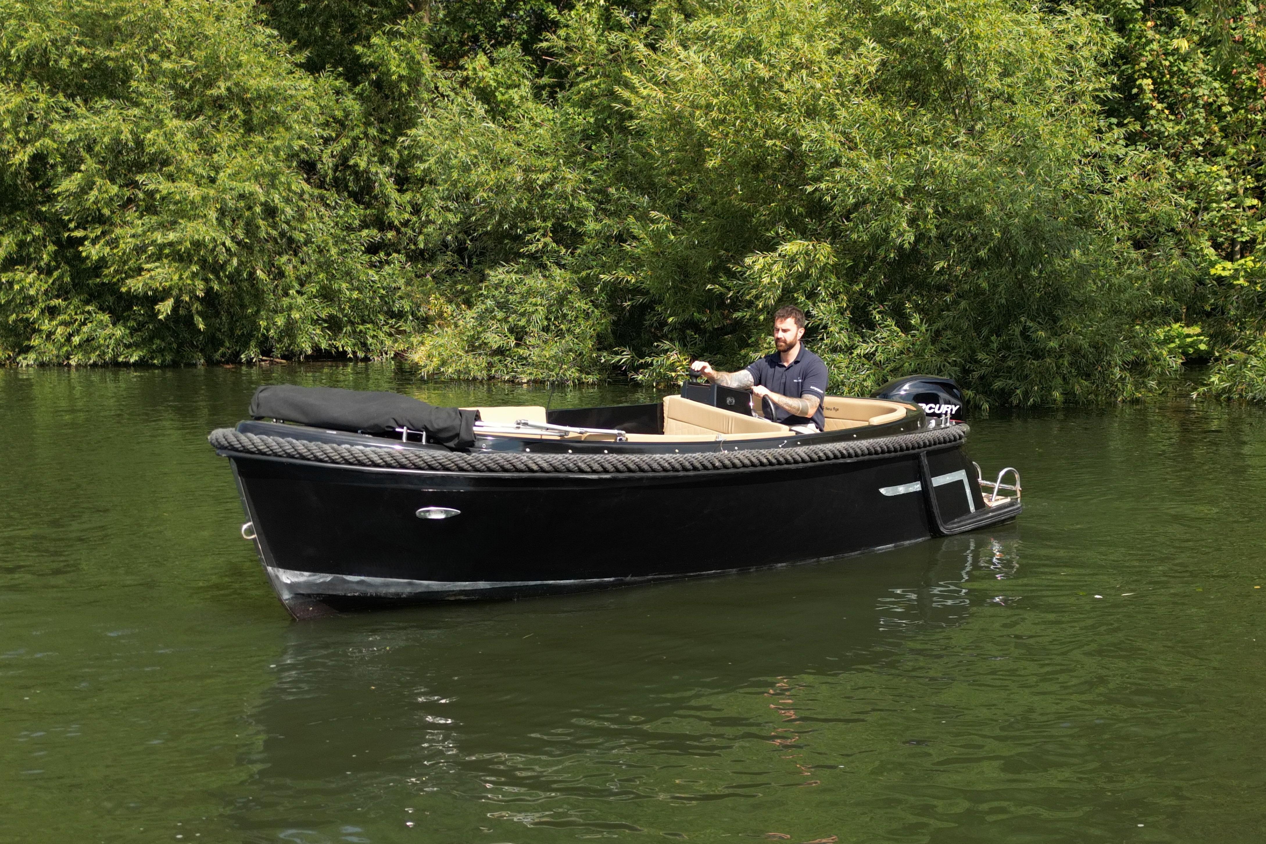Corsiva 565 New Age 2019 Corsiva 565 New Age boat cruising on a serene, green river.