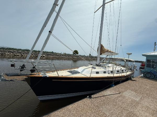 Tartan 4000 Sailboat docked at marina, Tartan 4000 model, 2012, with clear sky background.