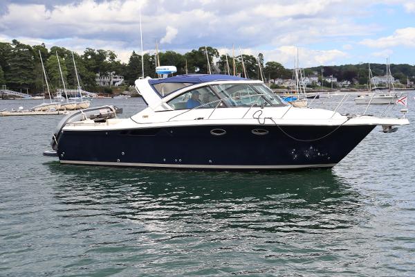 Tiara Yachts 3100 Coronet 2012 Tiara Yachts 3100 Coronet boat on calm water, surrounded by other vessels.
