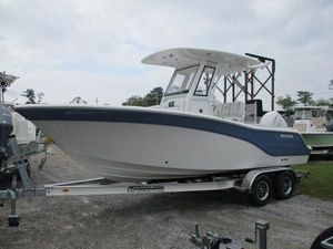Sea Fox 228 Commander 2025 Sea Fox 228 Commander boat on trailer, white and blue design, parked outdoors.