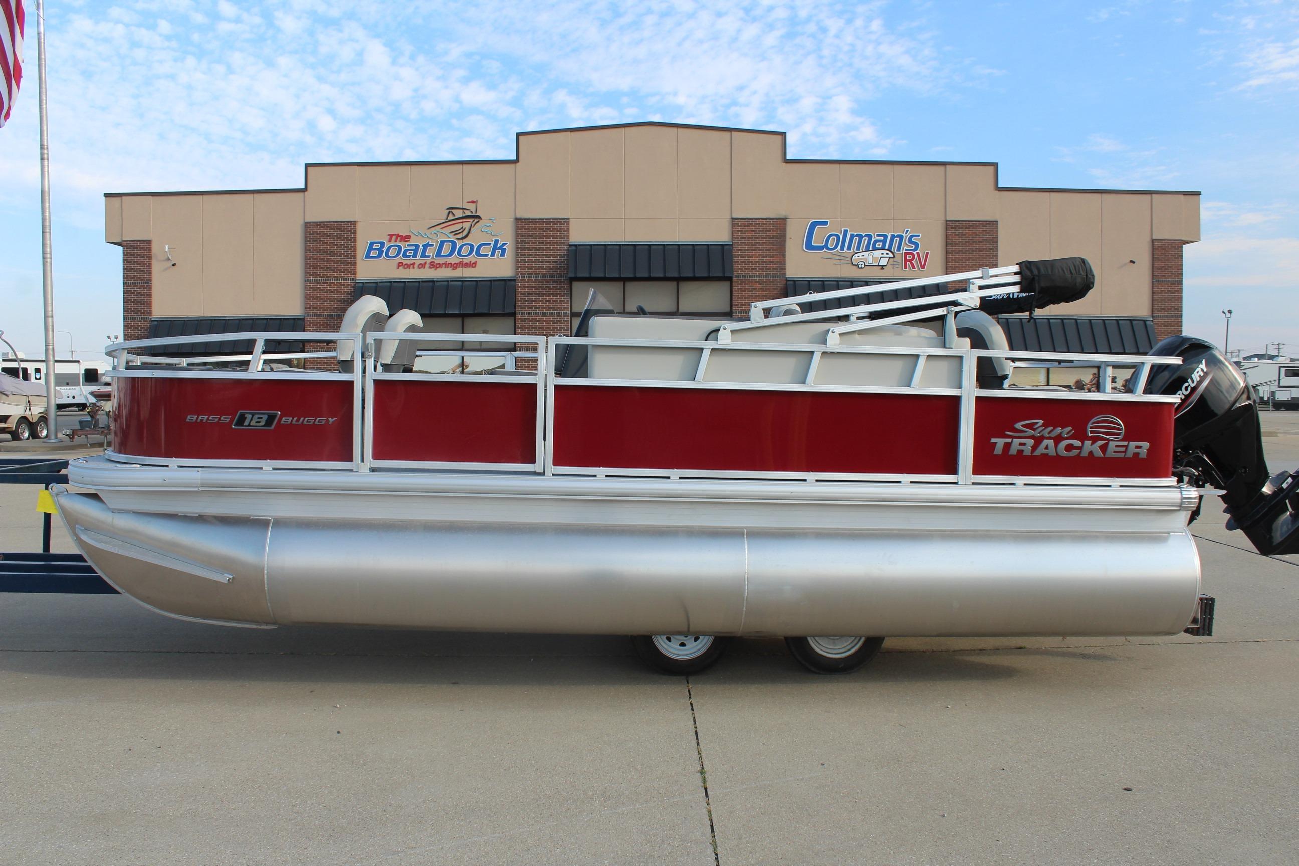 Sun Tracker Bass Buggy 18 DLX 2026 Sun Tracker Bass Buggy 18 DLX pontoon boat displayed at dealership.