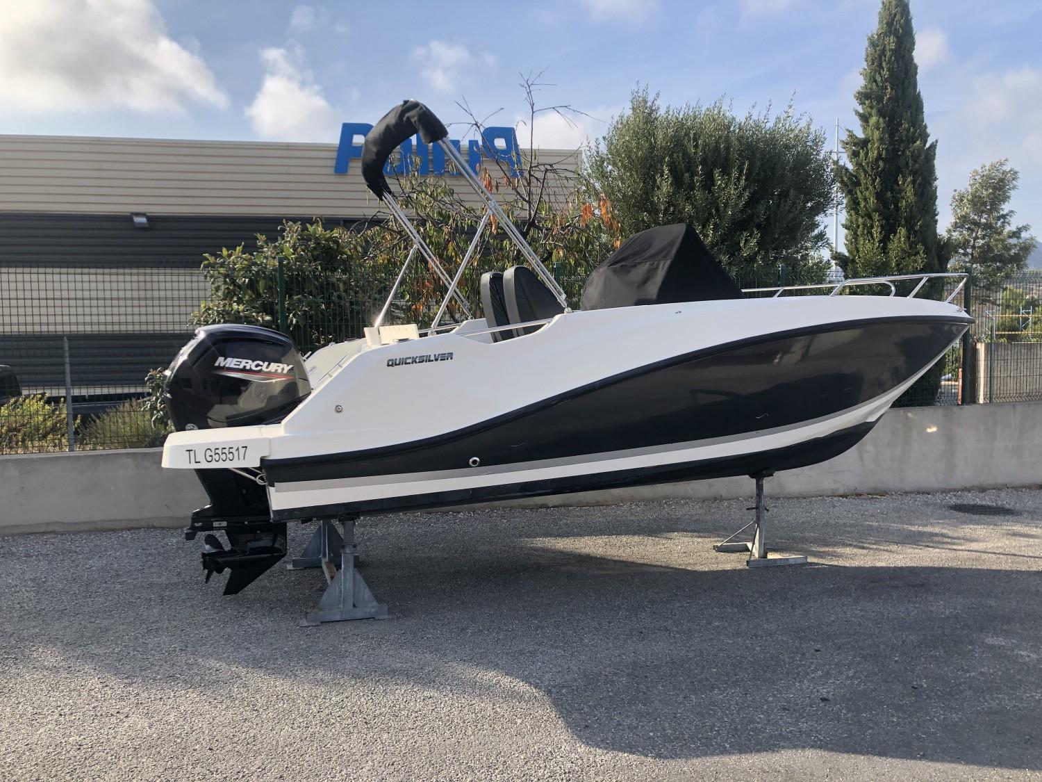 Quicksilver Activ 555 Open 2022 Quicksilver Activ 555 Open boat on display with Mercury engine.
