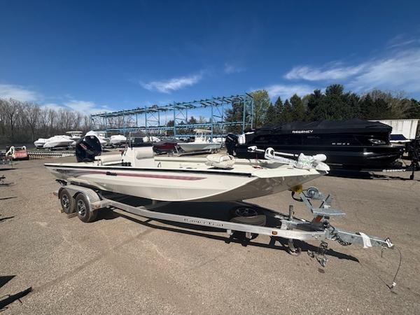 Ranger RB210 2025 Ranger RB210 boat on trailer in outdoor storage area.