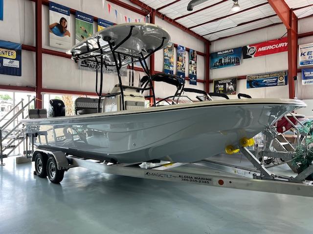 Carolina Skiff 23 LS 2025 Carolina Skiff 23 LS boat on trailer in showroom.