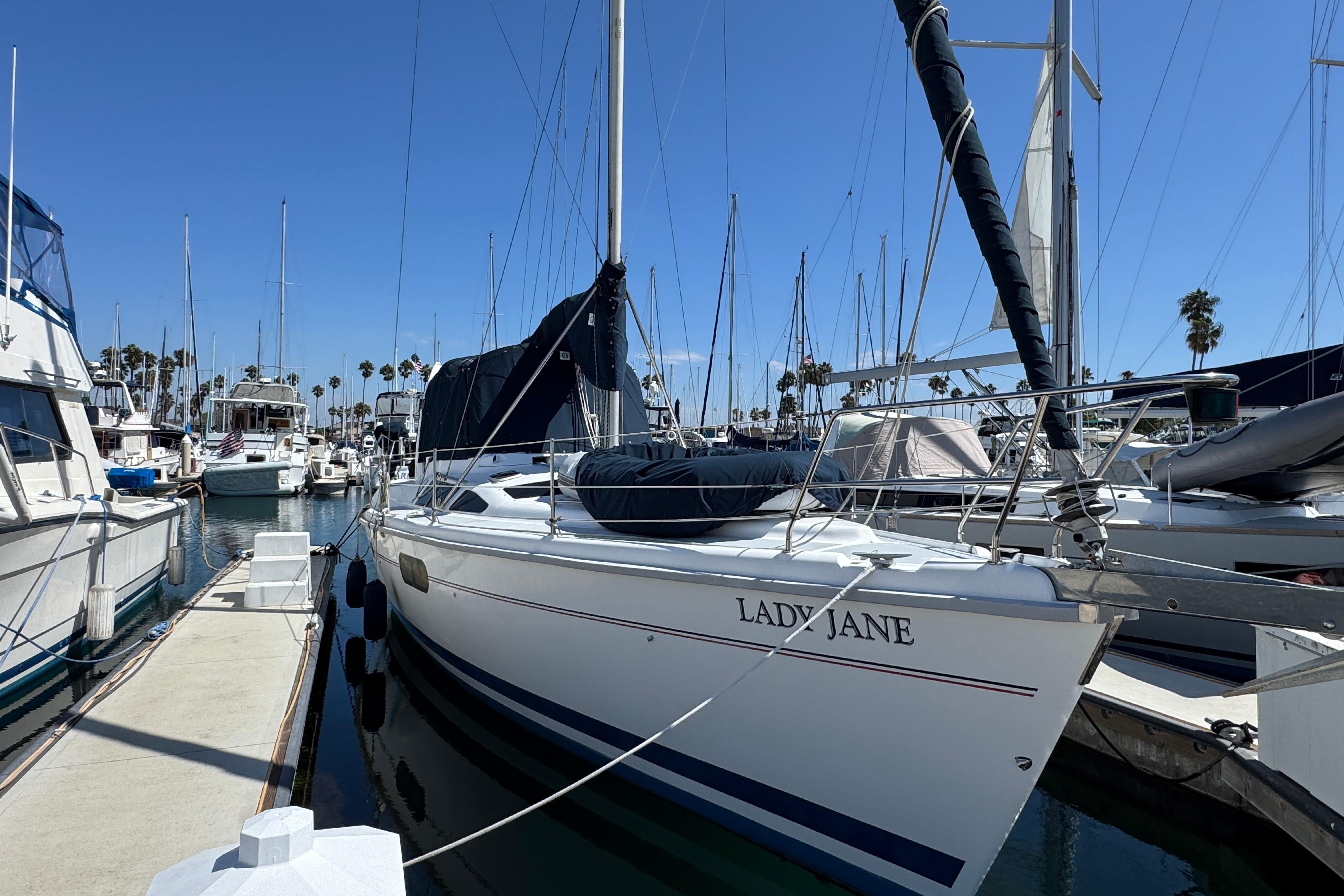 Hunter Passage 420 Sailboat "Lady Jane" docked, 1999 Hunter Passage 420, marina setting, clear blue sky.
