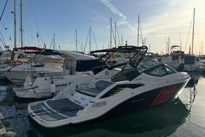 Fibrafort 272 GTO 2023 Fibrafort 272 GTO boat docked in a marina at sunset.