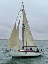 Zeilkotter Kotter One Off Design Vintage 1952 Zeilkotter Kotter One Off sailboat on open water, cloudy sky background.