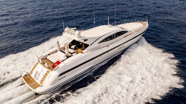 Mangusta 108 Luxurious 2013 Mangusta 108 yacht cruising on open water.