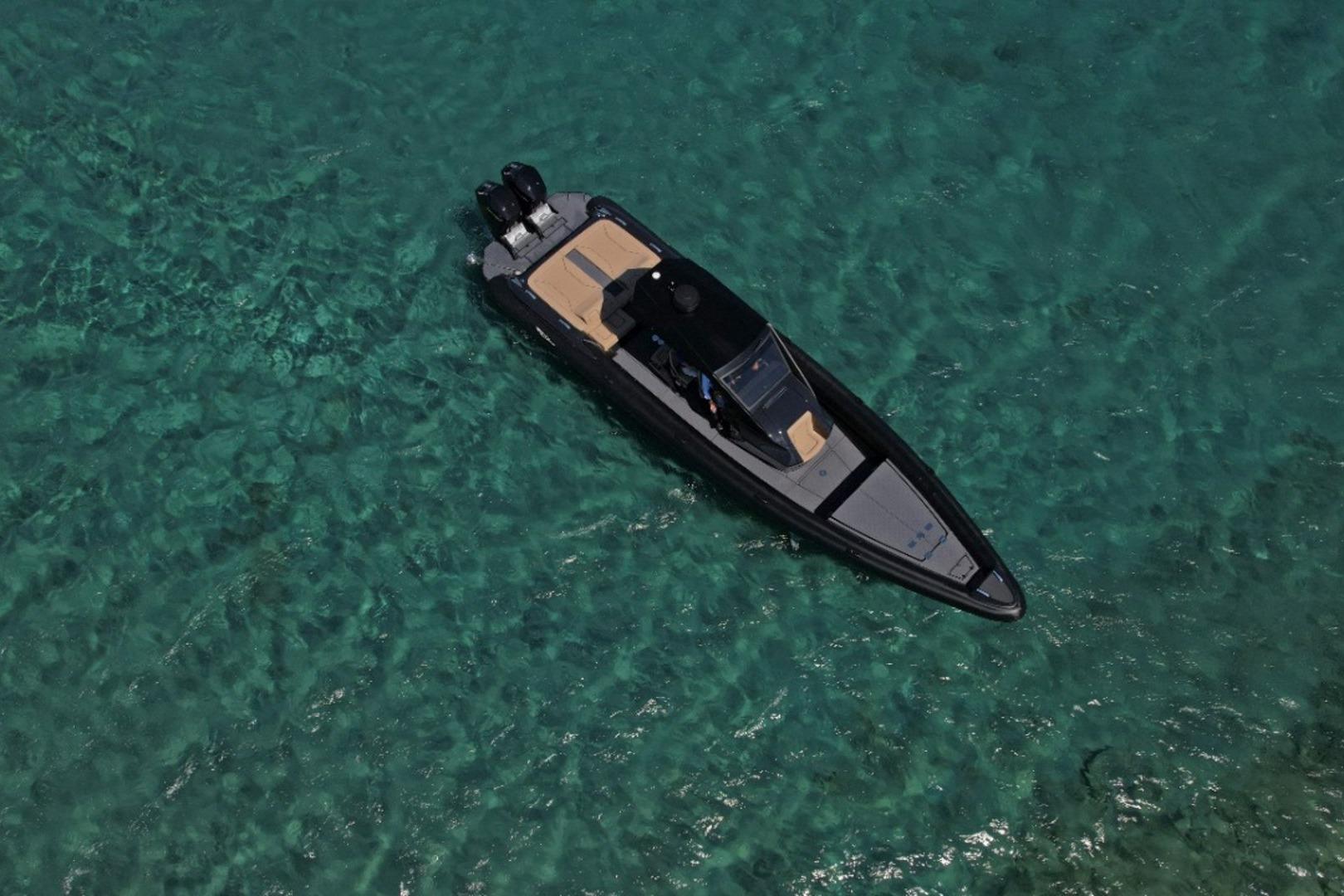 Ribco Venom 44 Open Aerial view of 2022 Ribco Venom 44 boat on clear turquoise water.