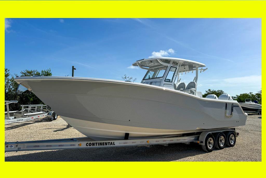 Sea Fox 328 Commander 2025 Sea Fox 328 Commander boat on trailer under clear blue sky.