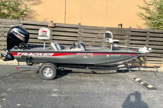 Tracker Pro Team 195 TXW 2017 Tracker Pro Team 195 TXW fishing boat on trailer, parked outdoors.