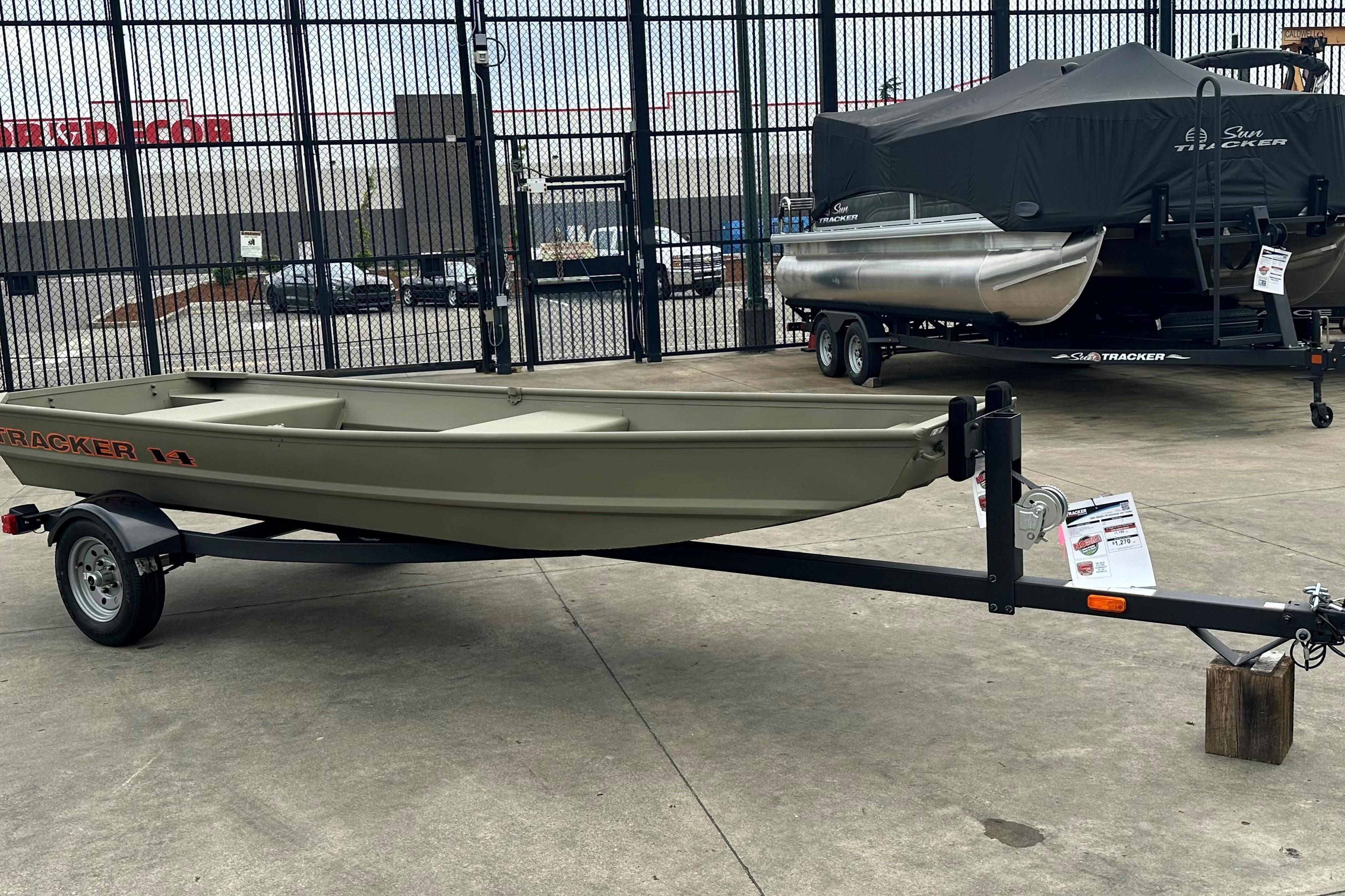 Tracker Grizzly 14 Jon 2026 Tracker Grizzly 14 Jon boat on trailer, displayed outdoors.