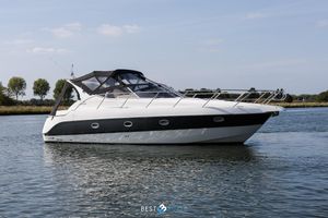 Sessa Marine Oyster 34 Sessa Oyster 34 yacht from 2000 on calm water, featuring sleek design and canopy.