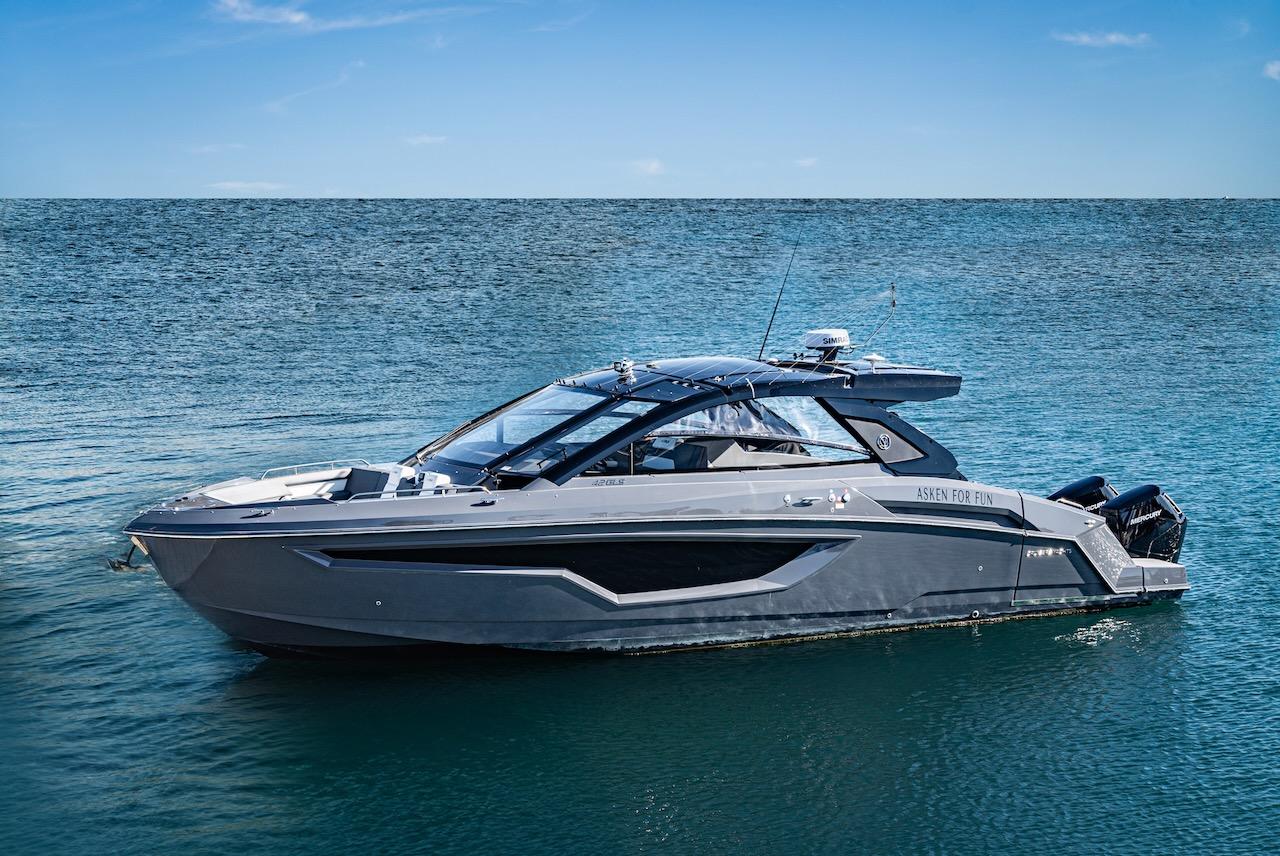 Cruisers Yachts 42 GLS 2023 Cruisers Yachts 42 GLS on calm blue water under clear sky.