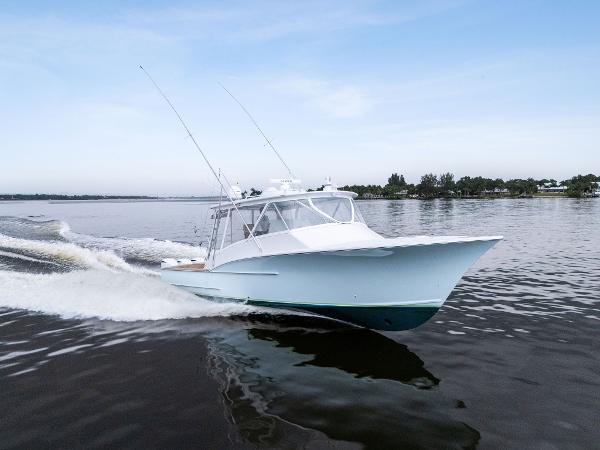 Custom Carolina 43 Cinco Boatworks Express 2017 Custom Carolina 43 Cinco Boatworks Express cruising on calm waters.