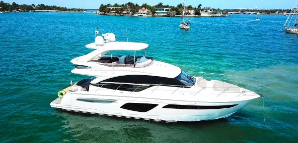 Princess F55 Luxurious 2018 Princess F55 yacht cruising on clear blue waters.