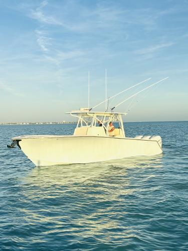 SeaHunter 33 2023 SeaHunter 33 boat on calm ocean waters.