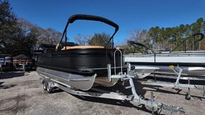 Viaggio Z22S 2025 Viaggio Z22S pontoon boat on trailer, parked outdoors.