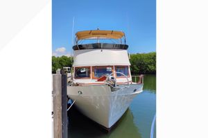 Marine Trader Double Cabin 1977 Marine Trader 40 Double Cabin yacht docked on a sunny day.