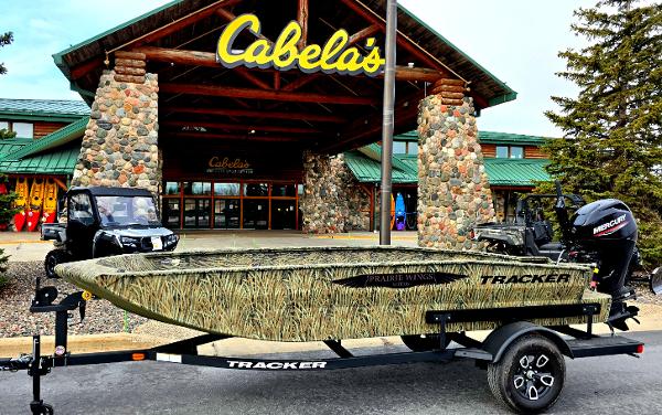 Tracker Grizzly 1650 T Prairie Wings Edition 2025 Tracker Grizzly 1650 T Prairie Wings Edition boat at Cabela's entrance.