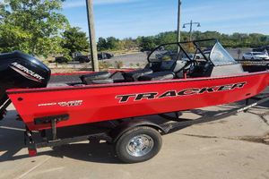 Tracker Pro Guide V-16 WT Red 2026 Tracker Pro Guide V-16 WT boat on trailer, parked outdoors.