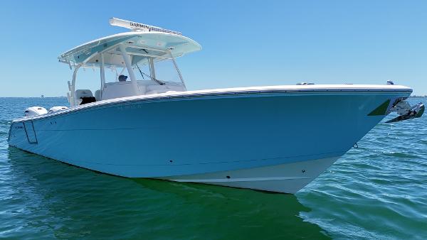 Cobia 350 Center Console 2023 Cobia 350 Center Console boat on clear blue water.