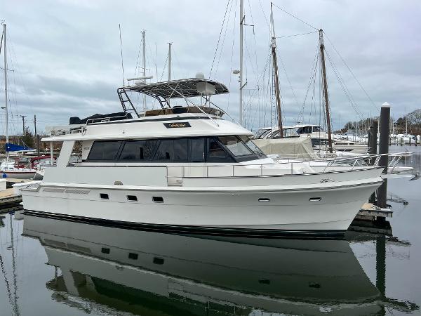 Southern Cross 53 1986 Southern Cross 53 yacht docked at marina, overcast sky.