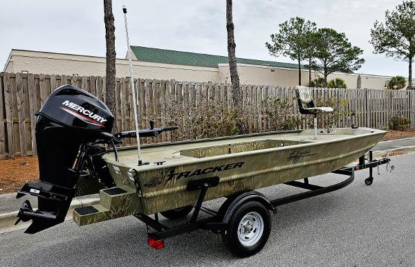 Tracker Grizzly 1654 T Sportsman 2025 Tracker Grizzly 1654 T Sportsman boat with Mercury engine on trailer.