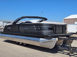 Godfrey 255 SBC 2026 Godfrey 255 SBC pontoon boat on trailer, side view.