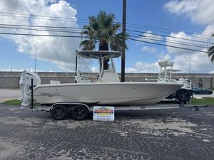 Pathfinder 2400 TRS 2025 Pathfinder 2400 TRS boat on trailer, parked outdoors under a cloudy sky.