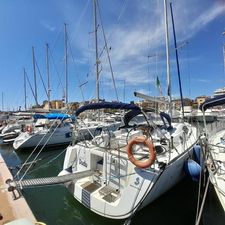 Beneteau Oceanis 43 2008 Beneteau Oceanis 43 sailboat docked in a marina under a clear blue sky.