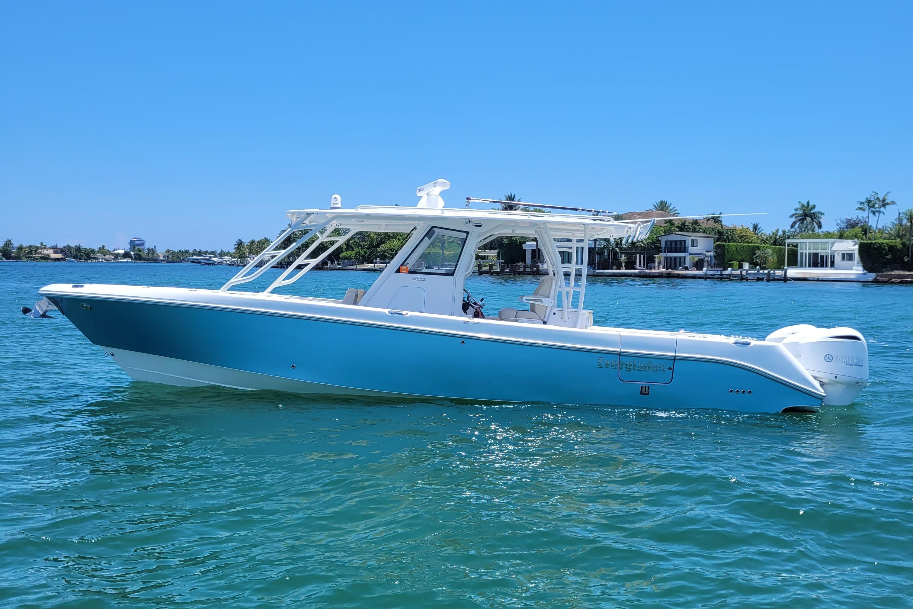 Everglades 355 Center Console 2018 Everglades 355 Center Console boat on clear blue water, sunny day.